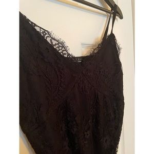 NWT black bodysuit. Never worn. Purchase from Francesca’s. Size XL. Brand TRIXXI